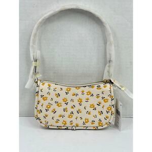 COACH Swinger 20 Floral Print Leather Bag Color is Chalk Multi NWT